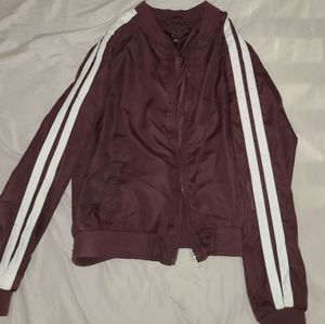 A small burgundy jacket
